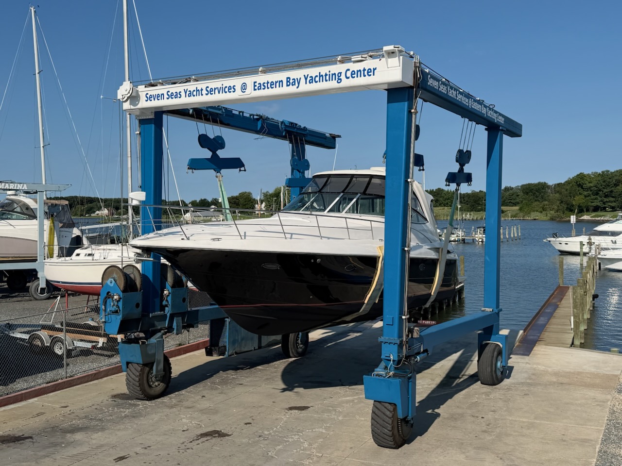 Boat in the travel lift at Eastern Bay Yachting Center