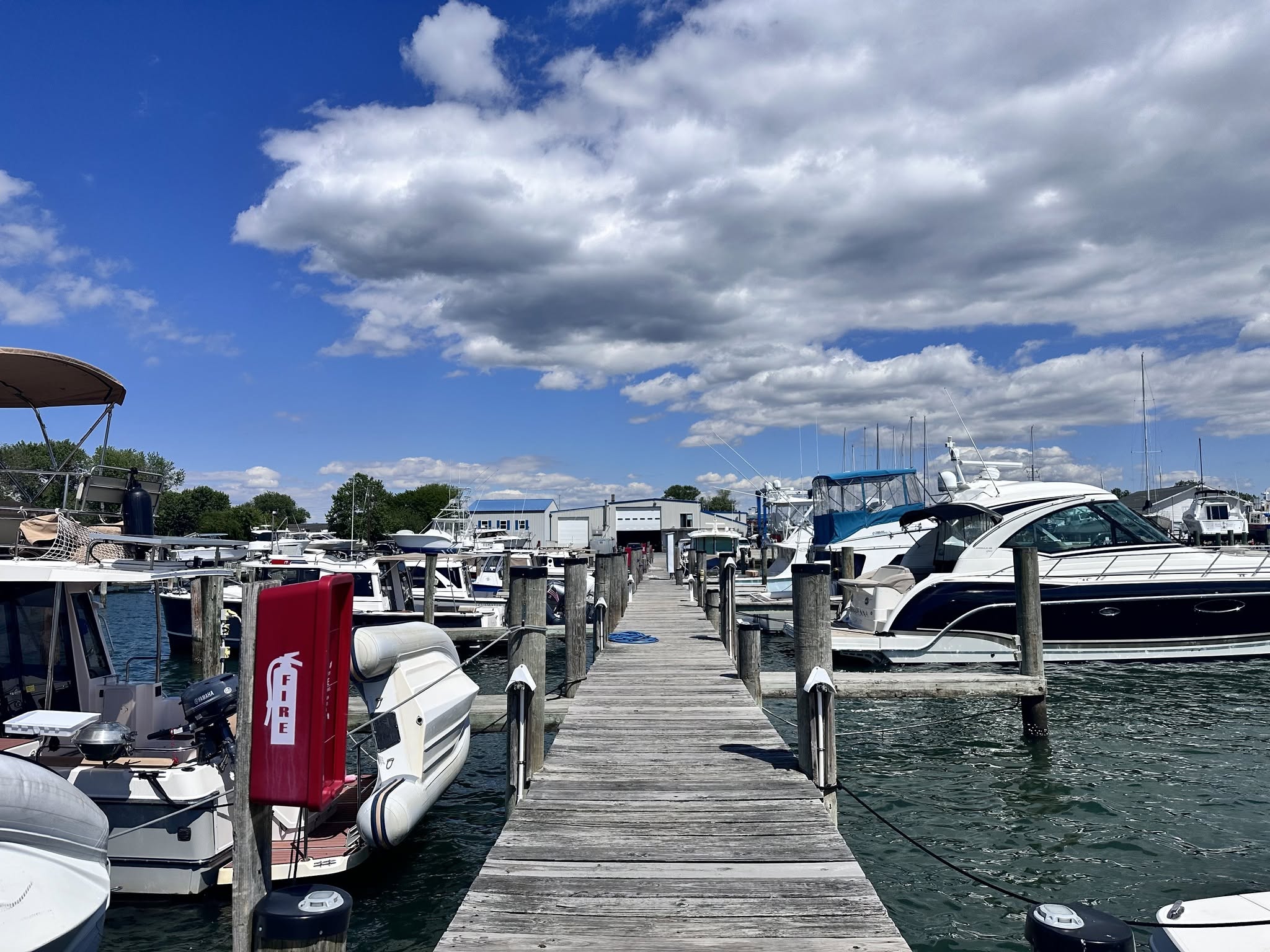 View down a dock at Eastern Bay Yachting Center with boats moored on both sides